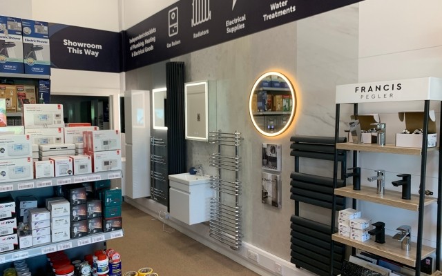 05 - Knaresborough Plumbing Supplies - Heated Towel Rails, LED Mirrors & Vanity Unit on display leading to showroom entrance